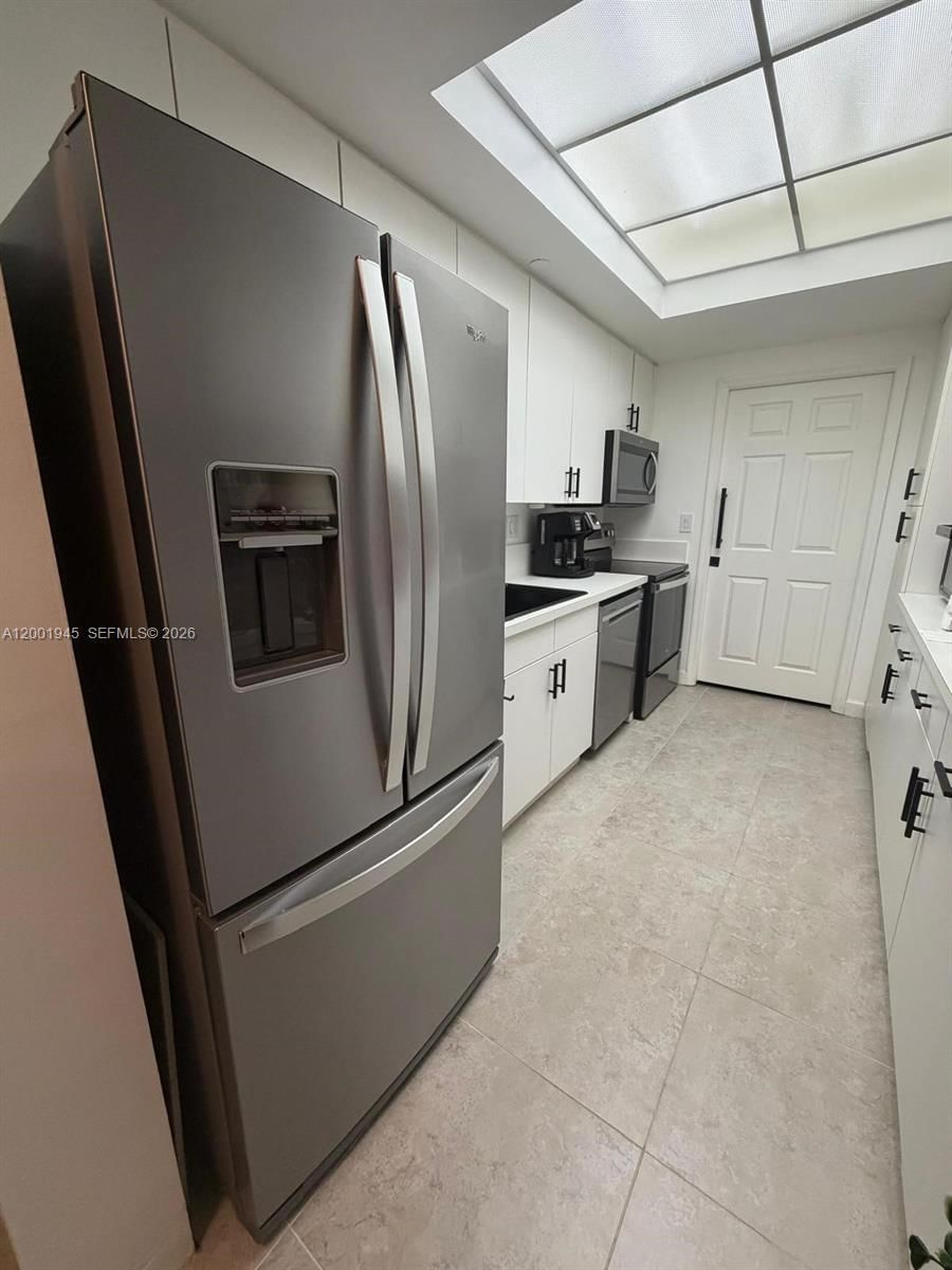 Real estate property located at 9725 52nd St #202, Miami-dade, Doral House Condo No 3, Doral, FL
