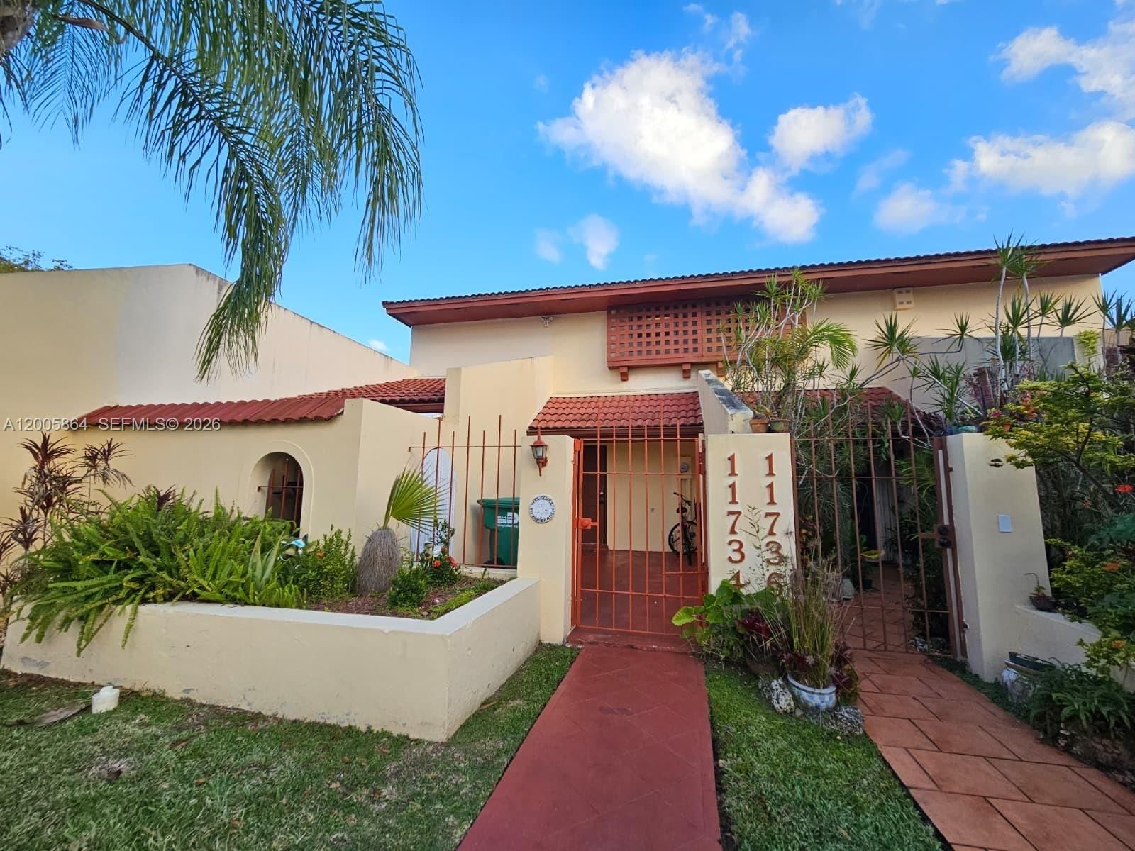 Real estate property located at 11734 112th Ln, Miami-dade, Woodstock Townhomes Sec 1, Miami, FL