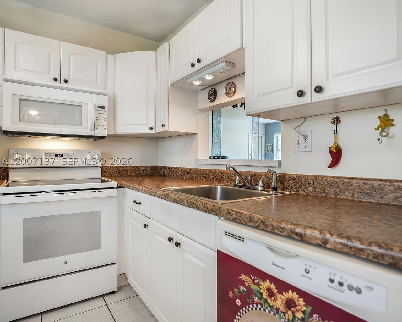 Real estate property located at 5171 Oakland Park Blvd #106, Broward, Petunia Gardens Condo, Lauderdale Lakes, FL