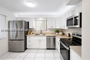 Real estate property located at 16168 Laurel Dr #201, Broward, Saddle Club Garden Apts A, Weston, FL