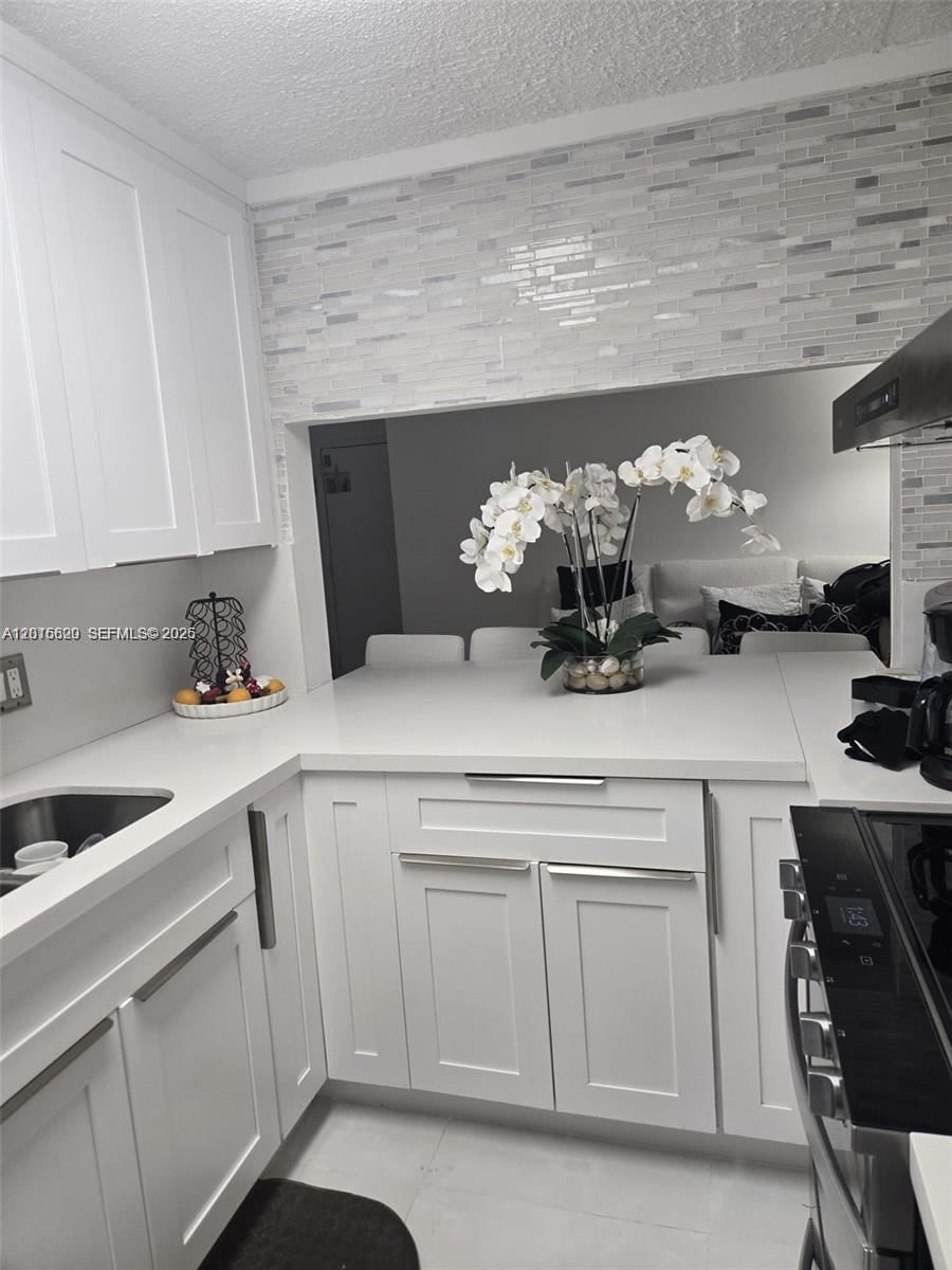 Real estate property located at 9410 Live Oak Pl #103, Broward, Live Oak Condominium Two, Davie, FL