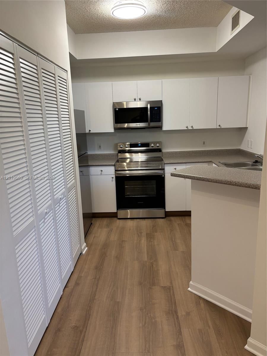 Real estate property located at 1900 Van Buren St #113B, Broward, Regent Park Condo, Hollywood, FL
