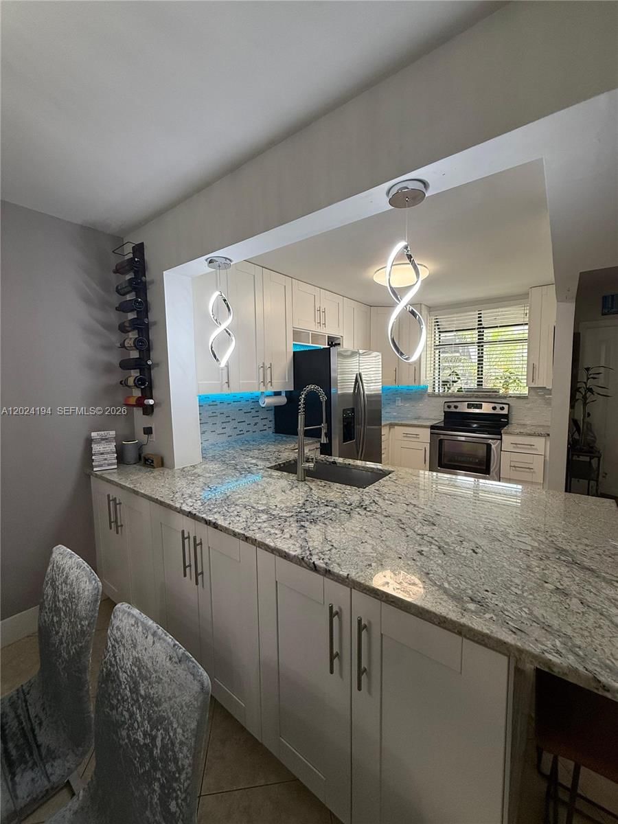 Real estate property located at 1244 Military Trl #711, Broward, Villas At Meadow Lakes Co, Deerfield Beach, FL