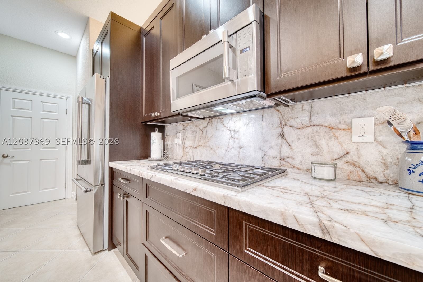 Real estate property located at 7725 128th Ave, Broward, Heron Bay Northwest, Parkland, FL
