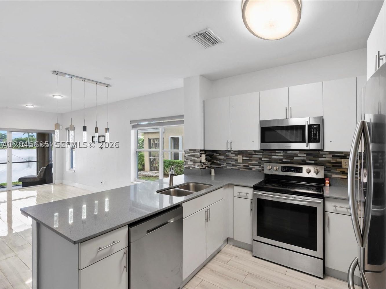 Real estate property located at 12170 5th Ct, Broward, Beautiful Lakefront Corner, Pembroke Pines, FL