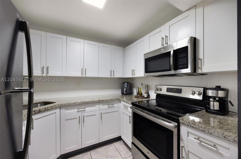 Real estate property located at 1300 122nd Ave #411B-2, Miami-dade, Peninsula At Intl Gardens, Miami, FL