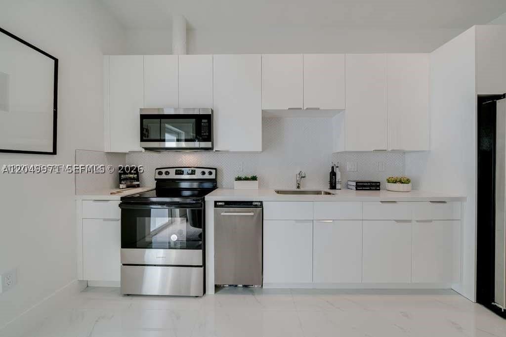 Real estate property located at 2936 27th St #2936, Miami-dade, Garvey Gardens, Miami, FL