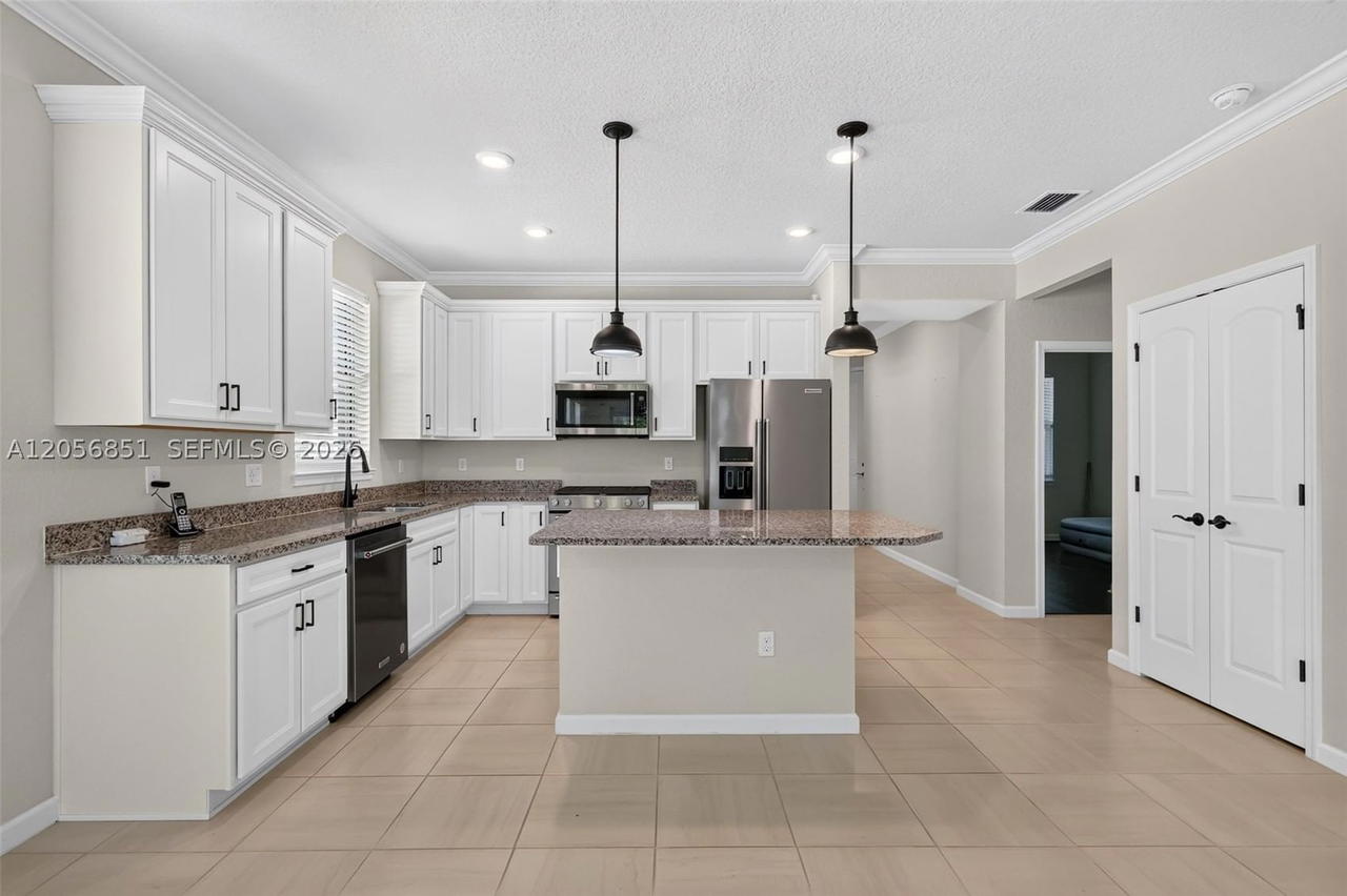 Real estate property located at 13903 Gingerline Dr, St Lucie, Del Webb At Tradition Pla, Port St Lucie, FL