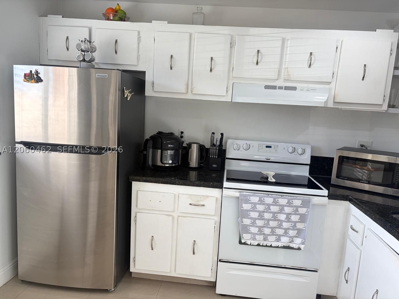 Real estate property located at 8814 Mcnab Rd #103, Broward, Greens Condo Apts Phase I, Tamarac, FL