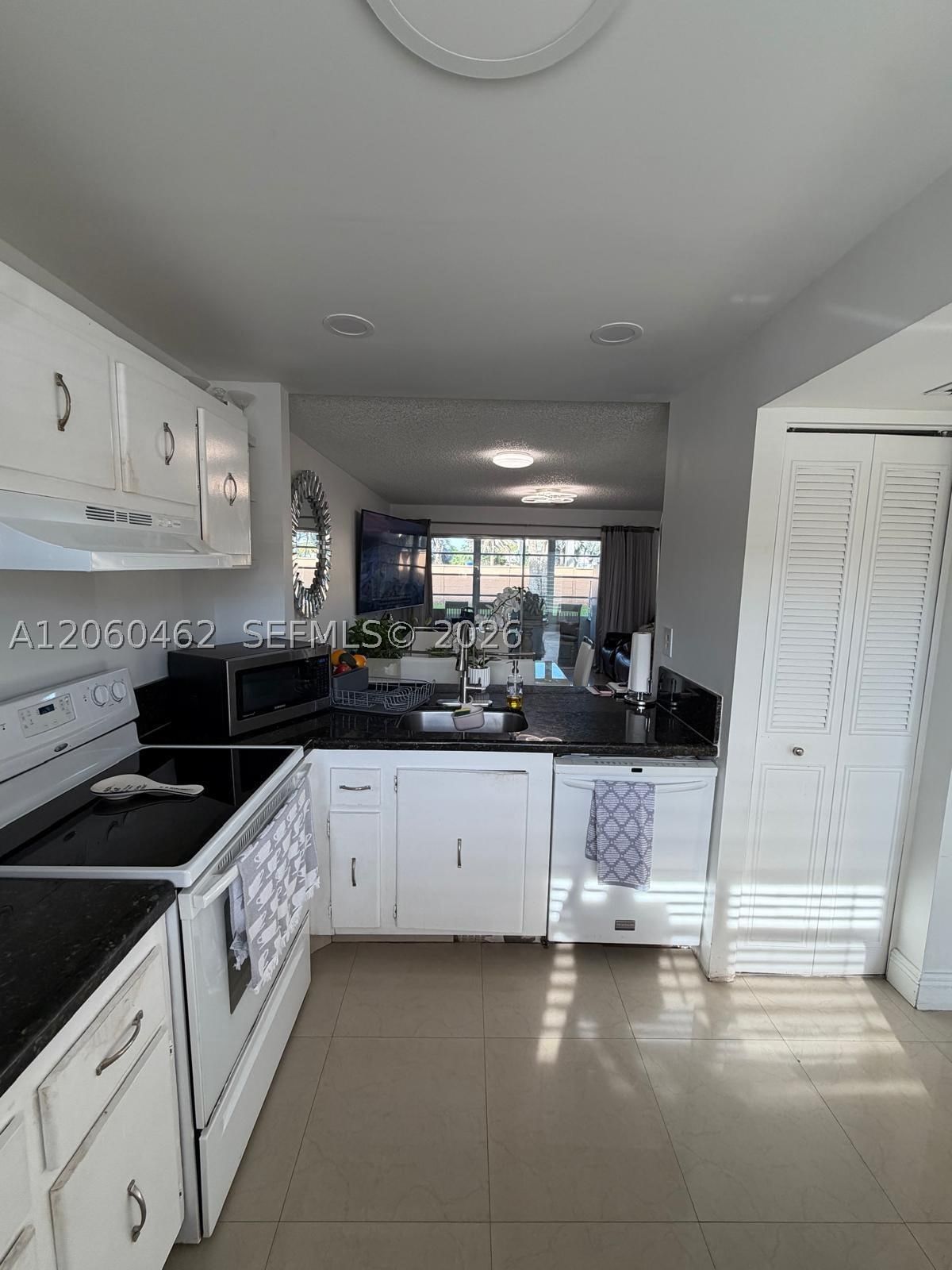 Real estate property located at 8814 Mcnab Rd #103, Broward, Greens Condo Apts Phase I, Tamarac, FL