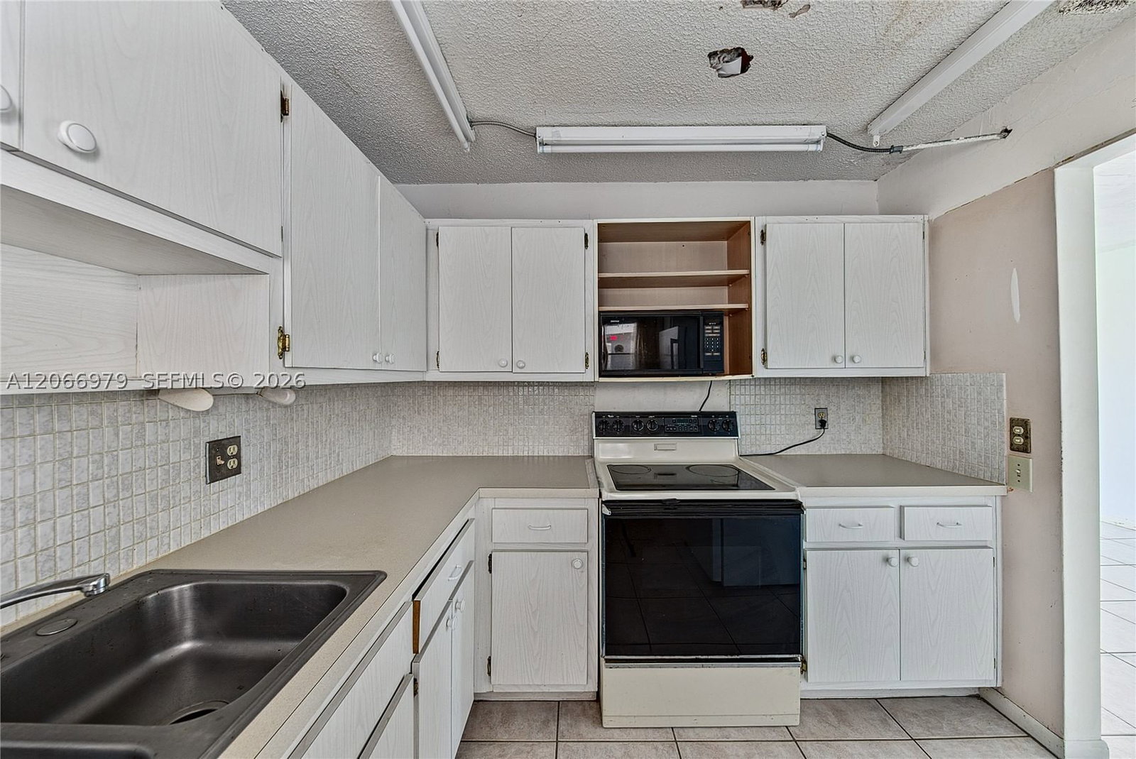 Real estate property located at 2491 82nd Ave #310, Broward, Arrowhead Condo No Iv, Davie, FL