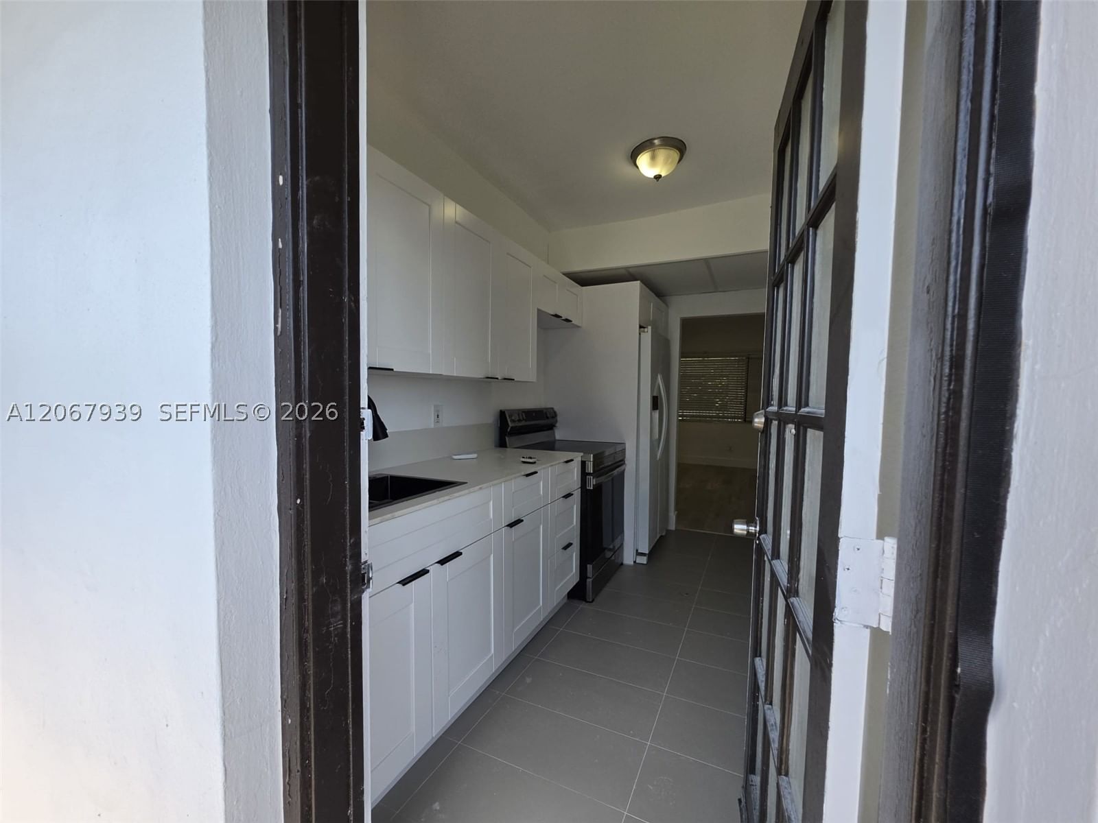 Real estate property located at 7845 Bayshore Ct #12A, Miami-dade, Tudor House Condo, Miami, FL