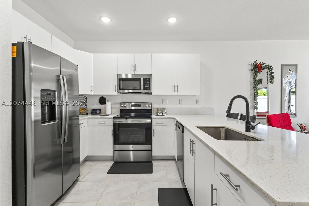 Real estate property located at 11438 34th Ct #11438, Miami-dade, Aquabella North, Hialeah, FL