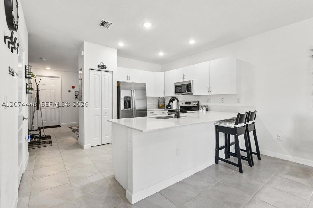 Real estate property located at 11438 34th Ct #11438, Miami-dade, Aquabella North, Hialeah, FL