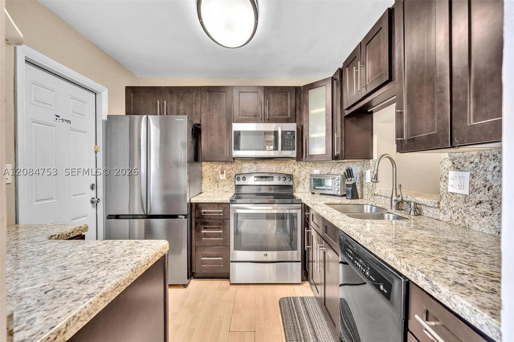 Real estate property located at 610 12th Ave #206, Broward, Meadowbrook Towers Condo, Hallandale Beach, FL