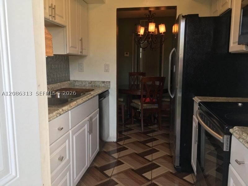 Real estate property located at 1825 Cleveland St #5, Broward, Dell Manor Condominium, Hollywood, FL