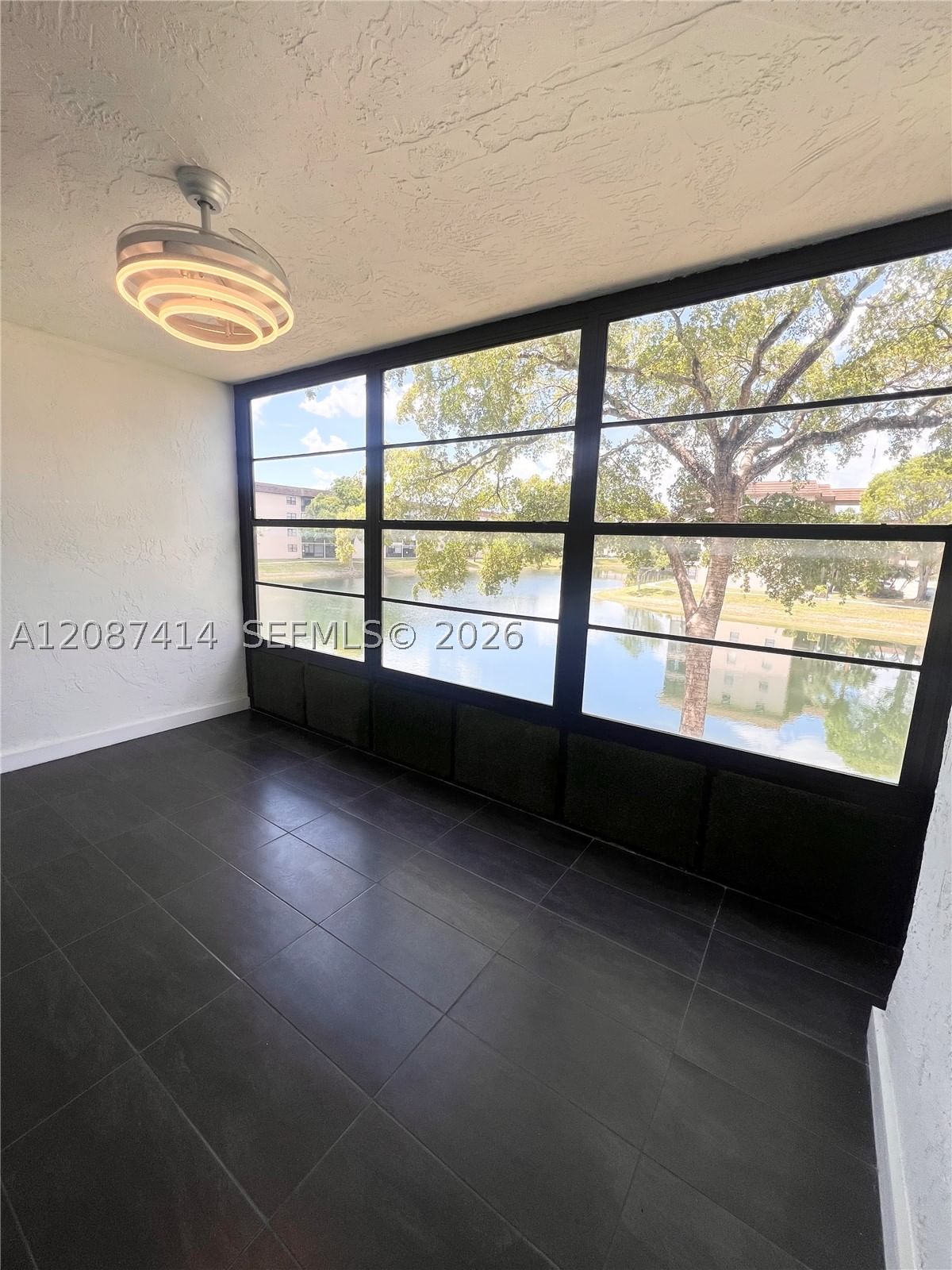 Real estate property located at 4930 Sabal Palm Blvd #206, Broward, Lakes Of Carriage Hills, Tamarac, FL