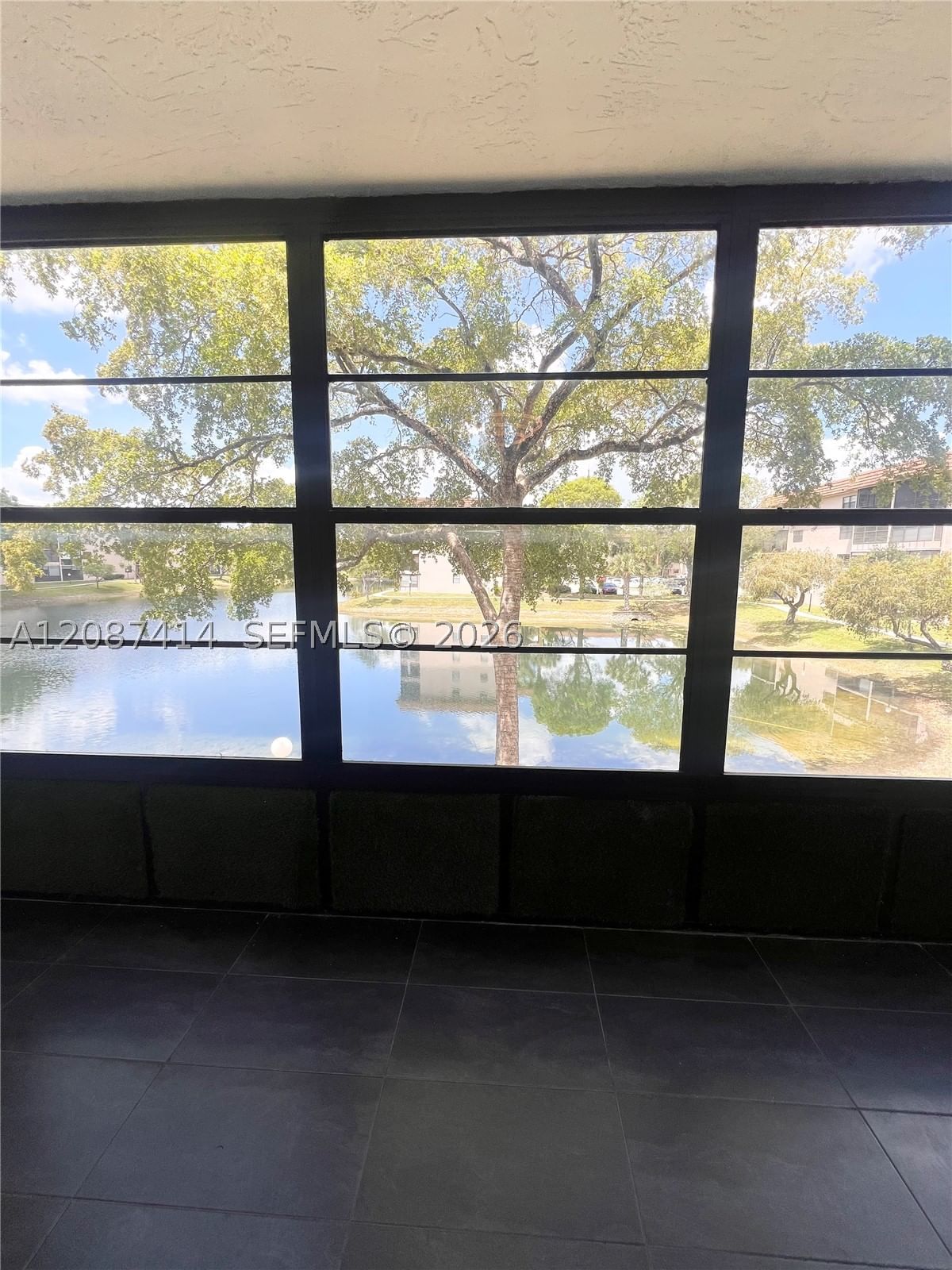Real estate property located at 4930 Sabal Palm Blvd #206, Broward, Lakes Of Carriage Hills, Tamarac, FL