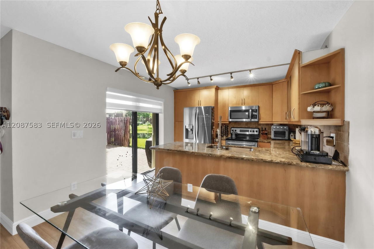 Real estate property located at 11882 12th Pl, Broward, Village At Lake Pine Ii, Davie, FL