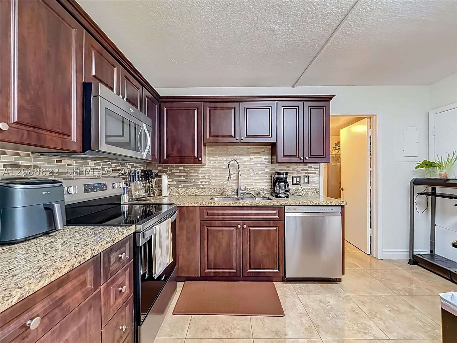 Real estate property located at 8740 Azalea Ct #102, Broward, Cypress At Woodmont Ii, Tamarac, FL