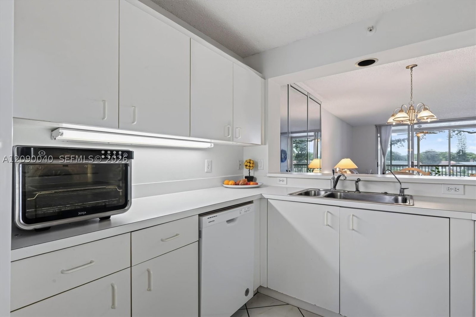 Real estate property located at 9587 Weldon Cir B203, Broward, Weldon Condominium, Tamarac, FL