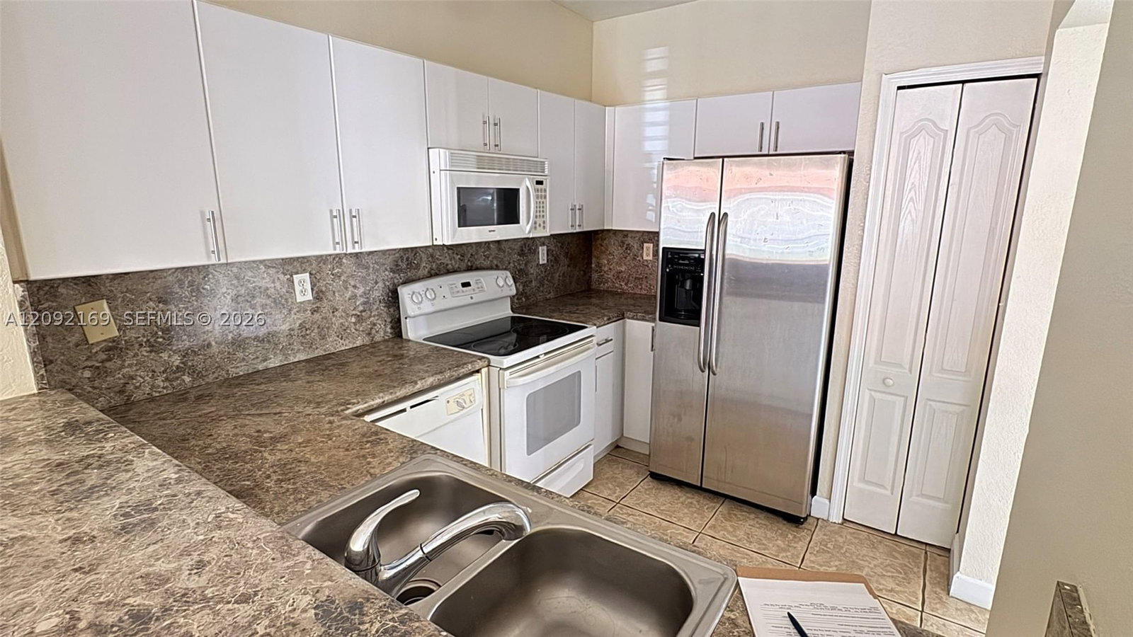 Real estate property located at 17650 73rd Ave #104-18, Miami-dade, Shoma Homes At Country Cl, Hialeah, FL