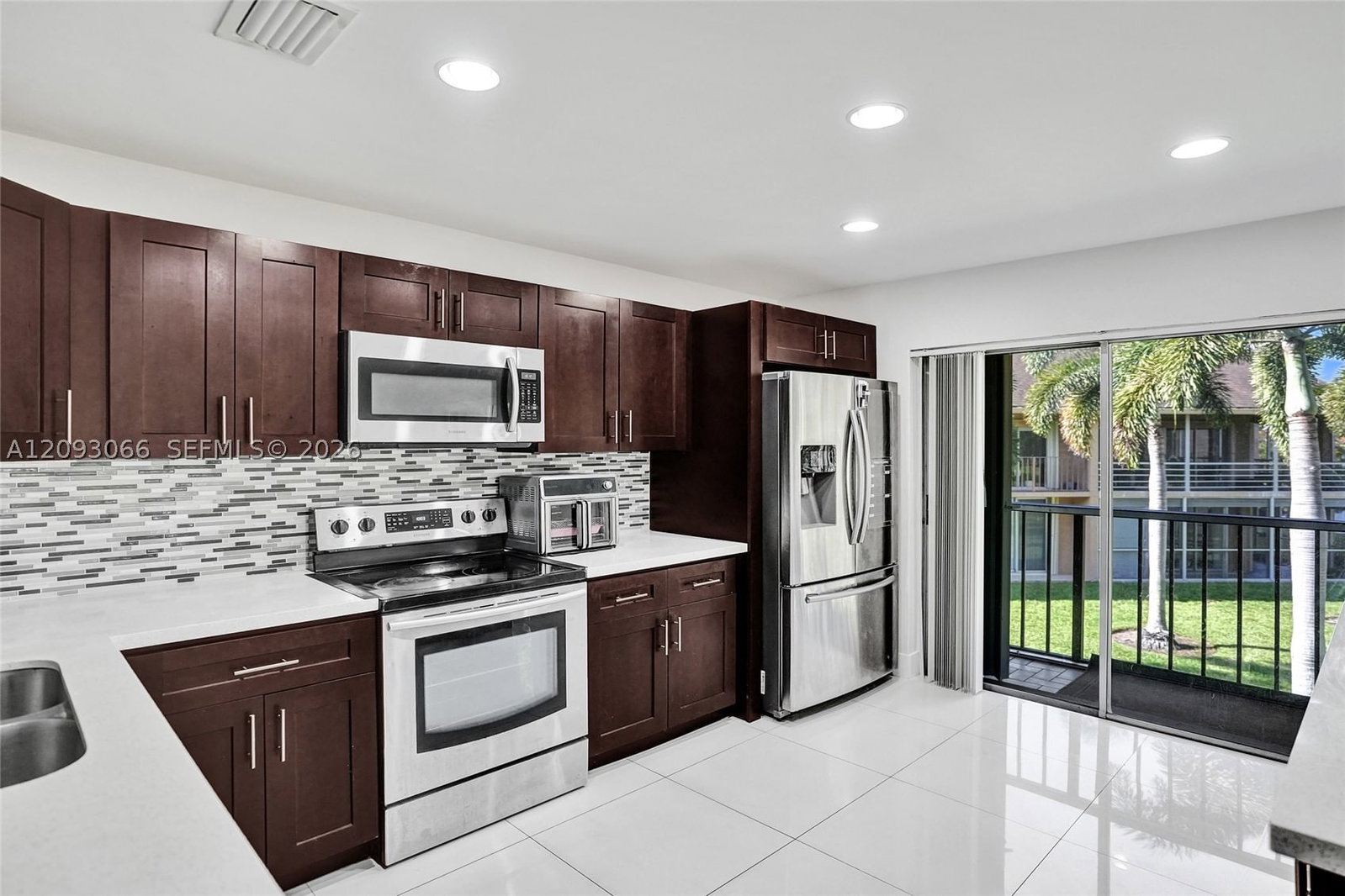 Real estate property located at 7581 86th Ter #201, Broward, Woodmont Apt Homes 67a, Tamarac, FL
