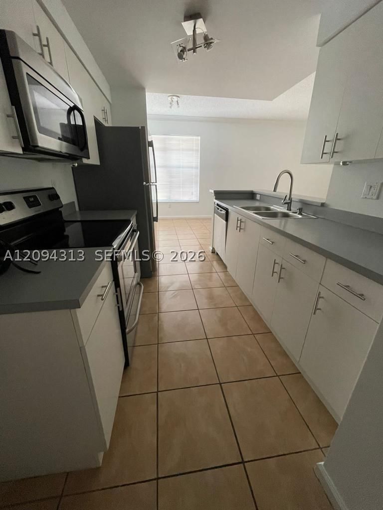 Real estate property located at 5840 Sample Rd #105, Broward, El-ad Poinciana Condo, Coral Springs, FL