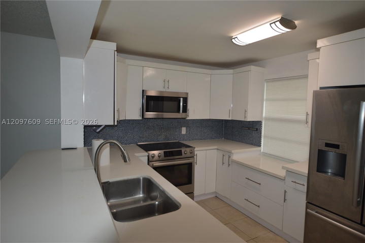 Real estate property located at 425 11th Ter #403, Broward, Meadowbrook Lakes Condo, Dania Beach, FL