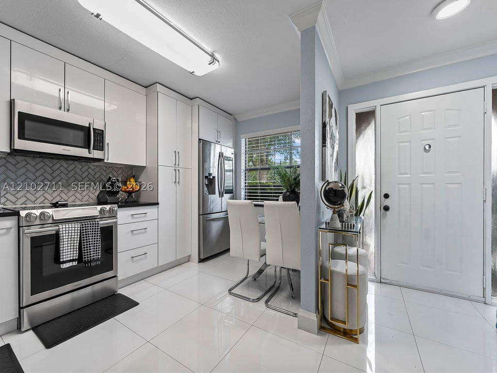Real estate property located at 10942 Sample Rd, Broward, Country Club Chalet Condo, Coral Springs, FL