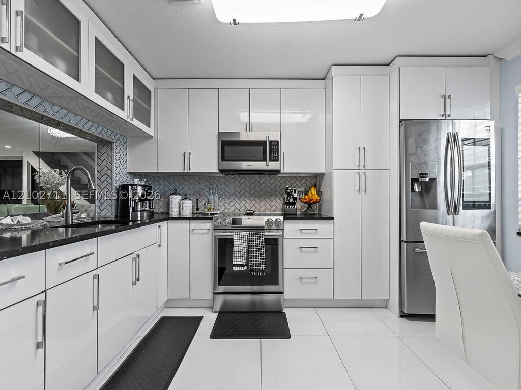 Real estate property located at 10942 Sample Rd, Broward, Country Club Chalet Condo, Coral Springs, FL