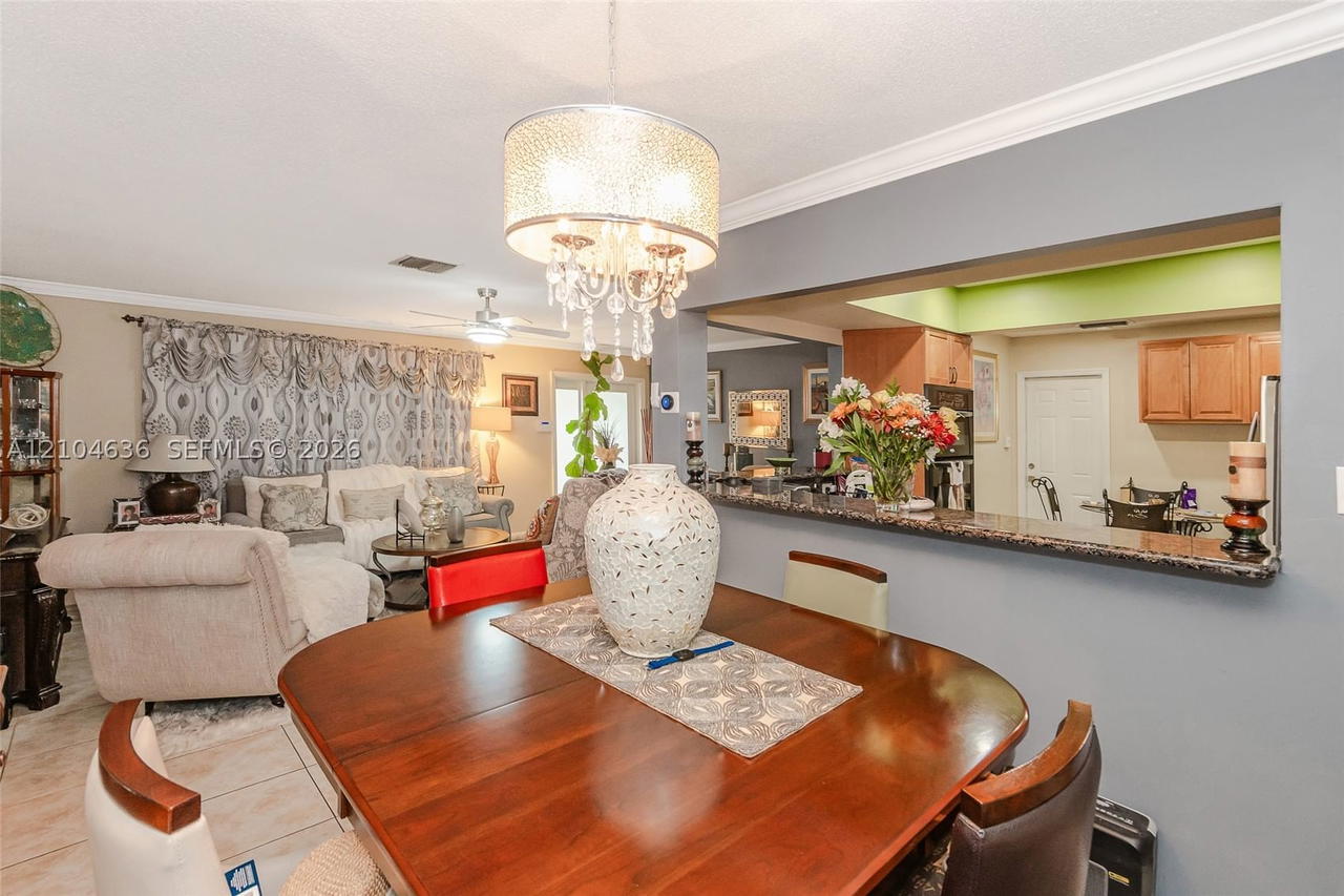 Real estate property located at 6100 73rd Ave, Broward, Mainlands Of Tamarac Lake, Tamarac, FL